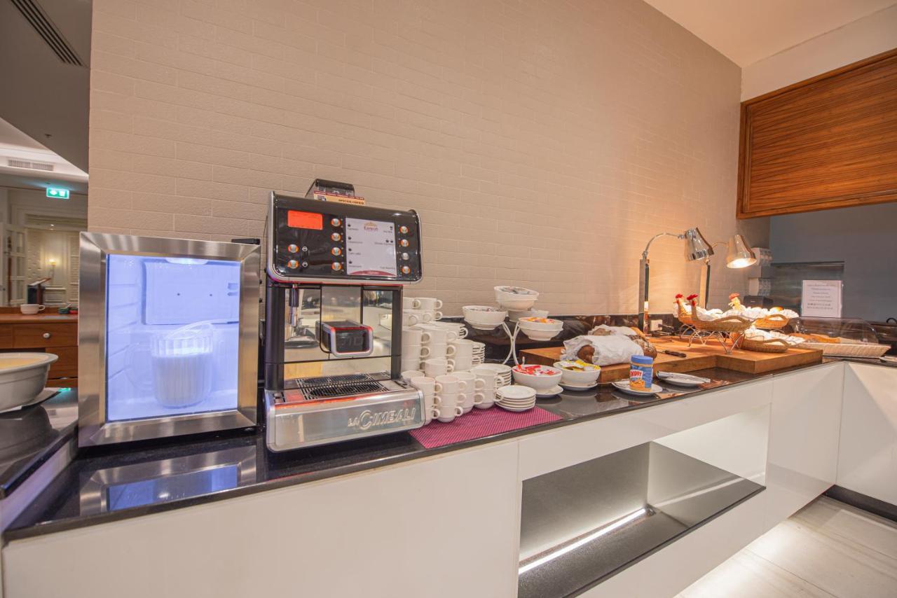 The Empress Premier Chiang Mai - Sha Extra Plus Ngoại thất bức ảnh A coffee machine in a hotel